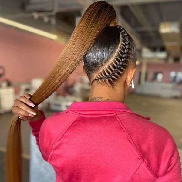 Ponytail Weave Braids - A woman with a tattoo wearing a red jacket