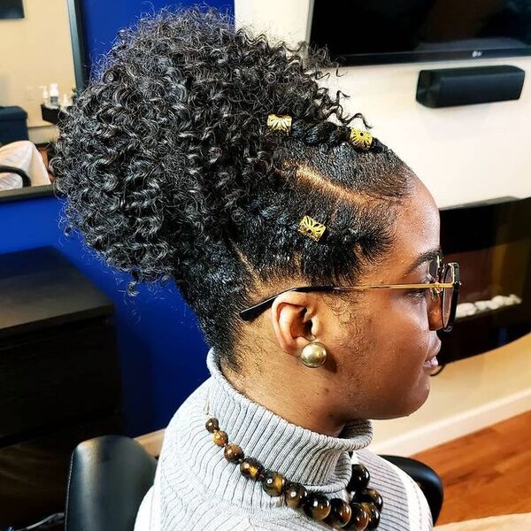 Puff Flat Twist - A woman with eyeglasses wearing a turtle neck sweater