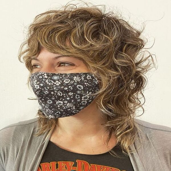 Sexy Shag Curly Hair - A woman in her mask