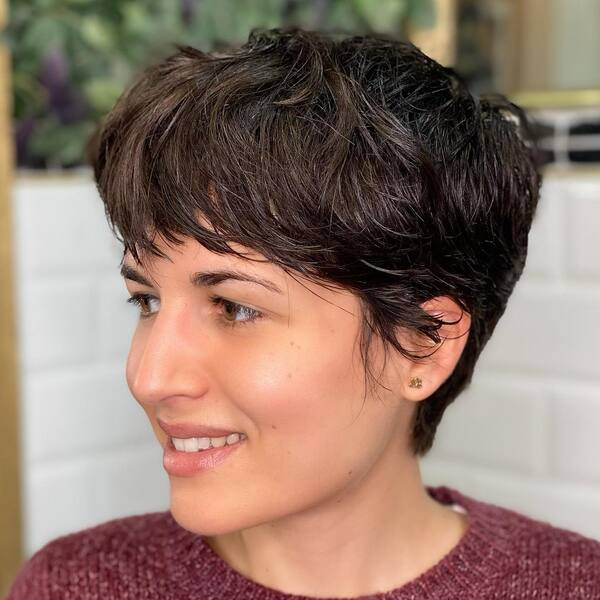 Short Tousled Pixie Shaggy Hair - A woman in her maroon top