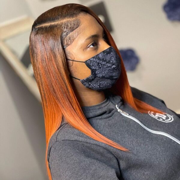 Side Part Natural Sew - A woman with printed face mask wearing a gray jacket