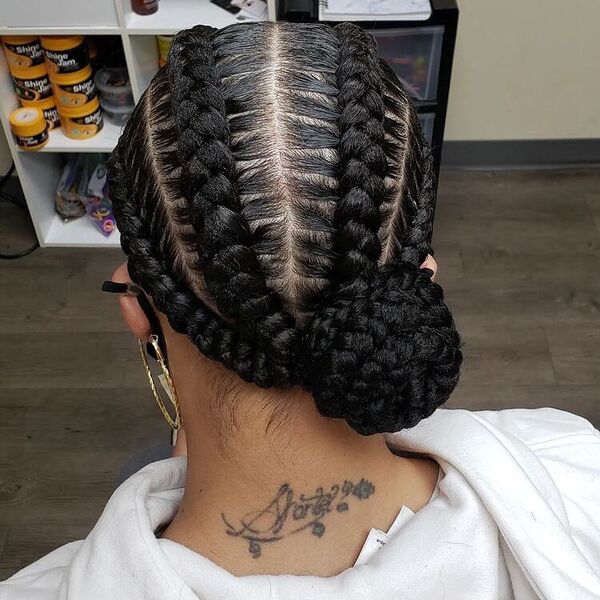 Stitch Cornrows Braids - A woman with tattoo wearing a color white hooded jacket