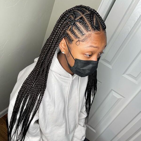 3 Layer Feed ins Cornrow Braids - A woman with black facemask wearing a white hooded jacket