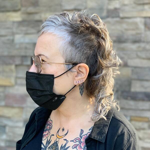 Blended Silver Curls - a woman wearing a black face mask