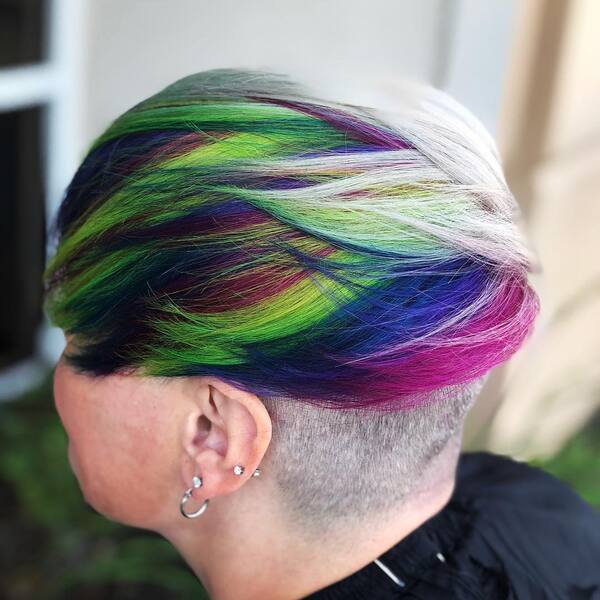 Colorful Libra With Undercut Hairstyle - a woman in a back view
