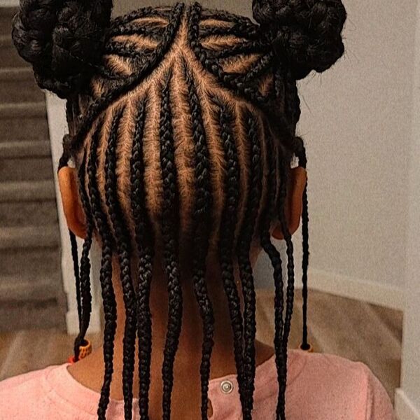 Cornrows Braids Twin Bun with Singles in the Back - A woman with hair beads wearing a pink blouse