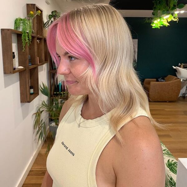 Fairy Floss Bangs for Wavy Hair - a woman in a side view