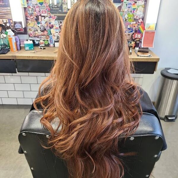Hair with Long Flowing Layers - A woman inside a salon