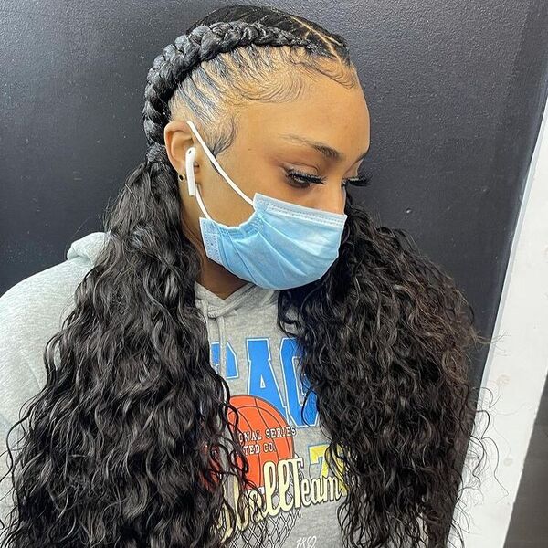 Fishtail Cornrow Braids with Extensions - A woman with surgical facemask wearing a gray printed hooded jacket