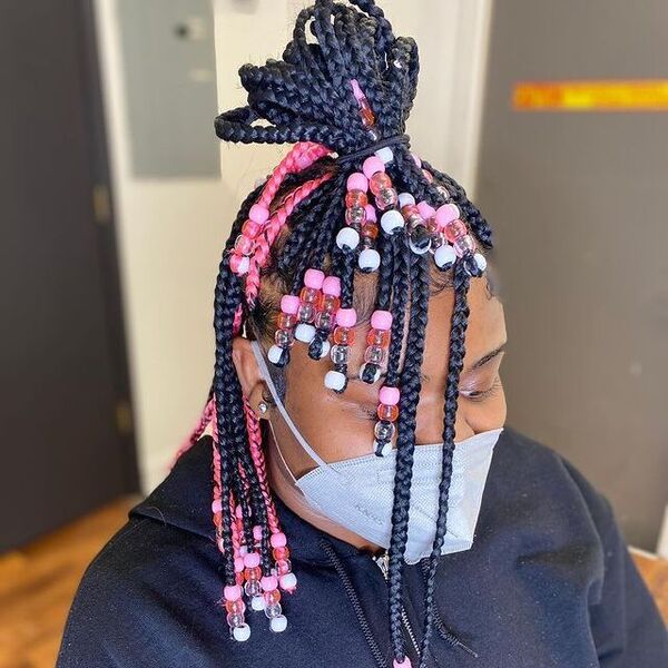 Knotless Bob Braids with Beads - A woman wearing a KN95 facemask