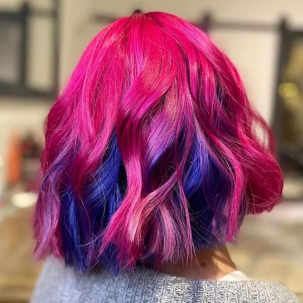 Livia Pink & Blue Hair Color - a woman in a back view