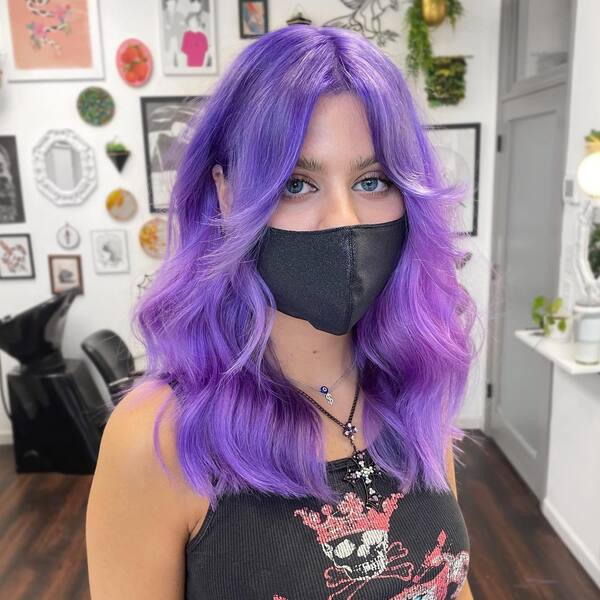 Long & Wavy Purple Curtain Fringe - a woman wearing a black face mask