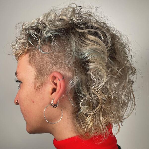 Mullet Curls Razor Cut - a woman in a side view