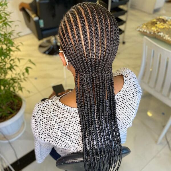 Natural Hair African Cornrow Braid Hairstyles- A woman inside a salon