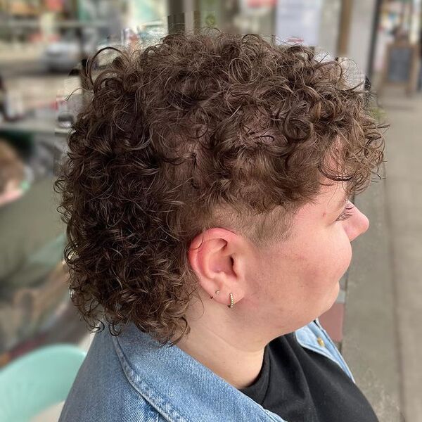 Perm Curly Mullet Hairstyles - a woman in a side view