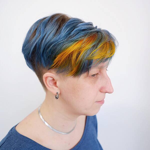 Pixie Yellow & Icy Blue Hair Color - a woman in a side view