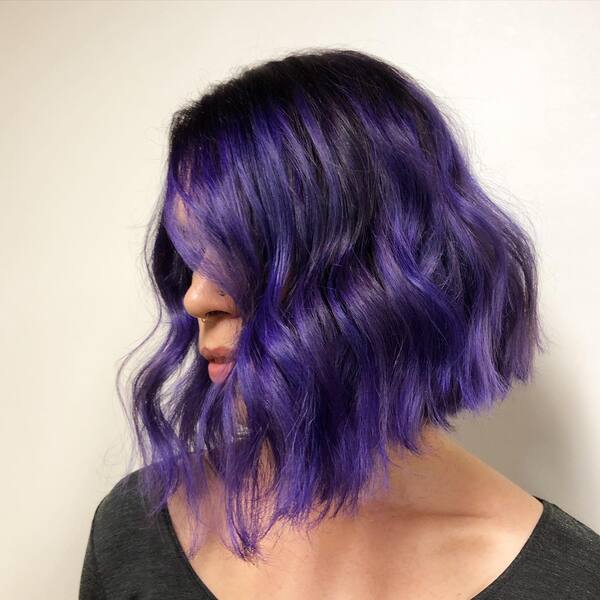 Purple Blunt Galaxy Hair Color Bob Hairstyle - a woman in a side view