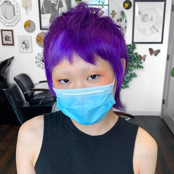 Purple Nashira Mullet Style - a woman wearing a face mask