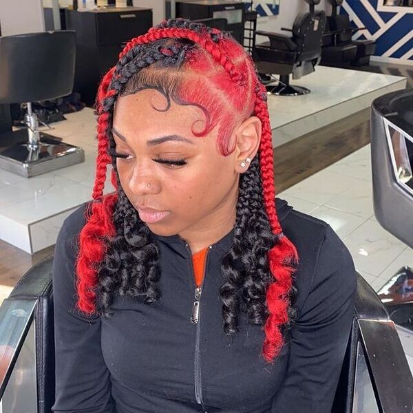 Red and Black Hairstyles with Baby Hair - A woman inside a salon