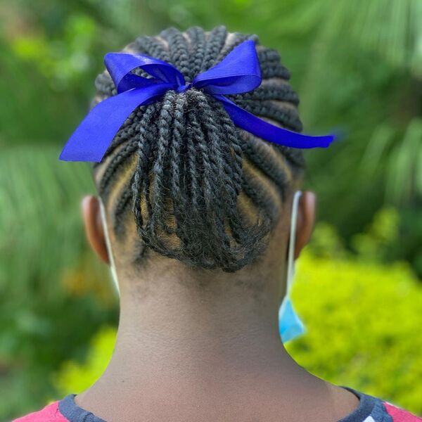 Short Hair Cornrow Braids - A woman with blue hair ribbon