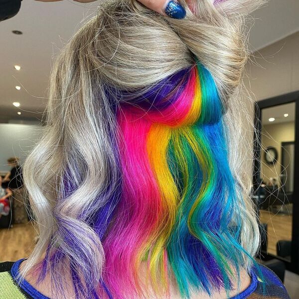 Short and Wavy Hidden Rainbow Hair - A woman inside a salon