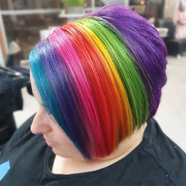 Side Part Rainbow Hair - A woman wearing a black shirt