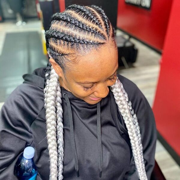 Stitch Cornrow Braids with Gray Hair Color - A woman wearing a black jacket