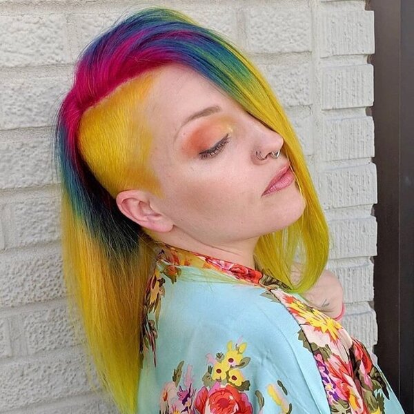 Sun Lob Cut Rainbow Hair - A woman wearing a floral blouse
