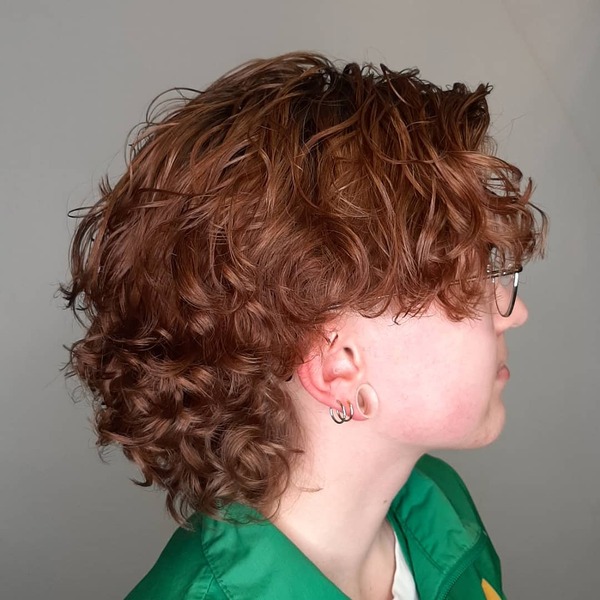 Curly Mullet With Thick Hairstyle - a woman in side a view