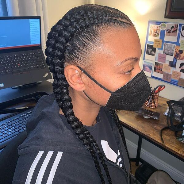 Twin Cornrows Braid - A woman with black facemask wearing a adidas jacket