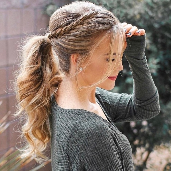 Twist on a Classic Ponytail  - A woman wearing a gray longsleeve