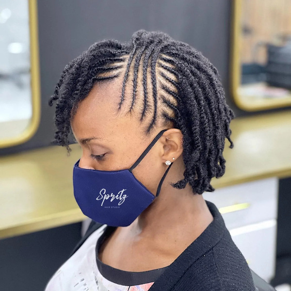 Two Strand Twists - a woman wearing a blue face mask
