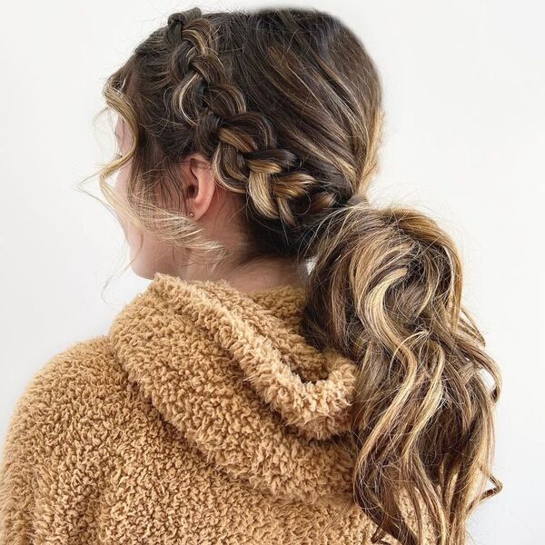 Winter Formal Ponytail Updo - A woman wearing a brown coat jacket