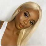 50 Beautiful Black Girls with Blonde Hair in 2022 - a woman wearing a white sleeveless