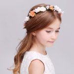 50 Beautiful Flower Girl Hairstyles in 2022 -a girl wearing a white dress