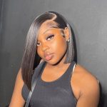 50 Trendy Bob Hairstyles for Black Women in 2022 - a woman wearing a black sleeveless