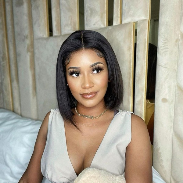 Black Bob Hair and Asymmetrical Finger Waves - a woman wearing a dress