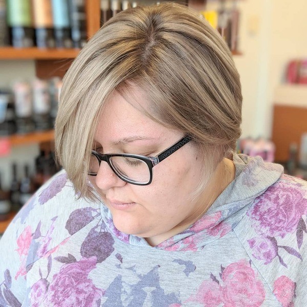 Blonde Classic Side-Parted Bob Cut - a woman wearing an eyeglasses