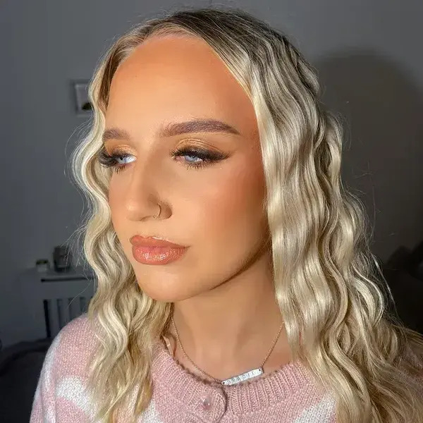 Blonde Crimped Hairstyle - a woman in a side view