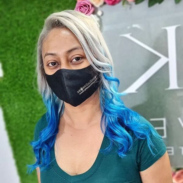 Blue and Blonde Reverse Ombre - a woman wearing a face mask