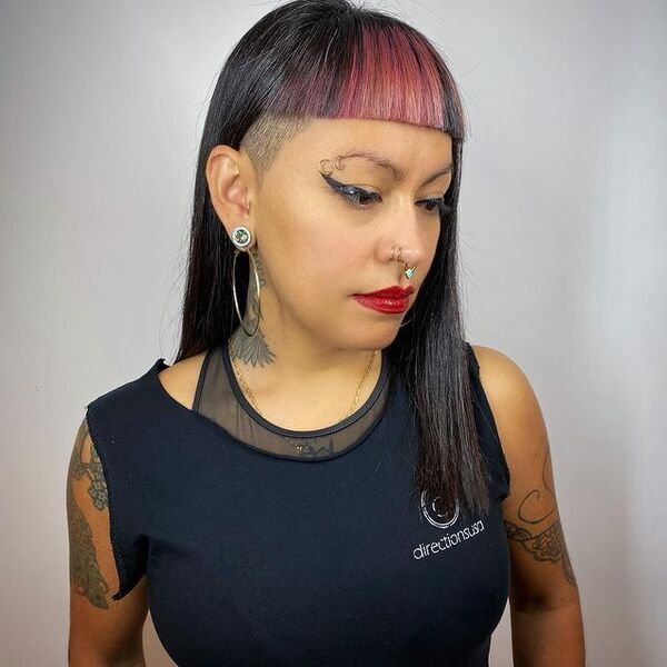 Blunt Bangs with Undercut - a woman wearing black dress