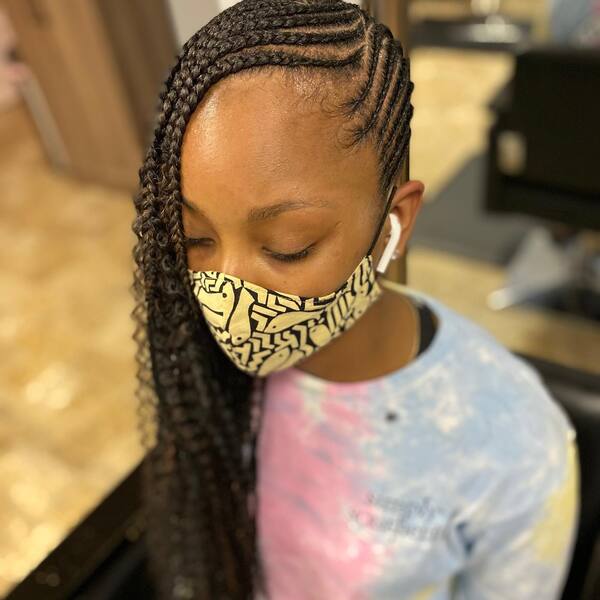 Bohemian Lemonade Braids - a woman wearing a face mask