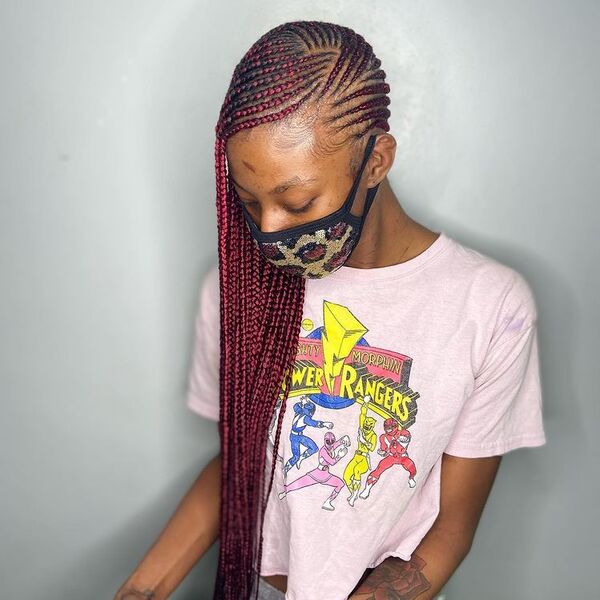 Burgundy Lemonade Braids - a woman wearing a pink shirt