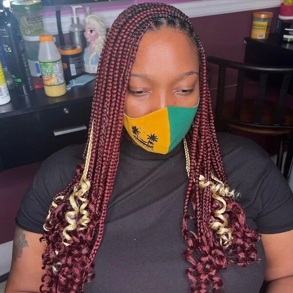 Burgundy Protective Hairstyle with Peep of Blonde - a woman wearing face mask