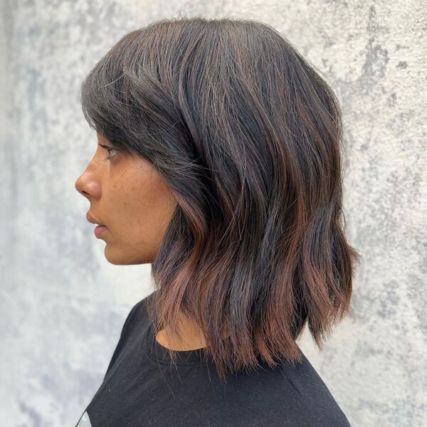 Chestnut Flash Brown Highlights - a woman in a side view