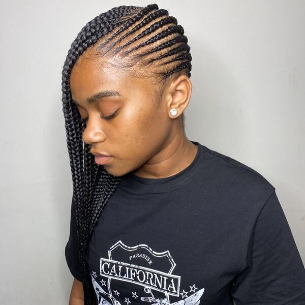 Chic Lemonade Braids - a woman wearing a black shirt