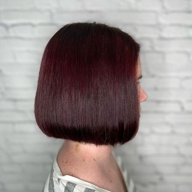 Classic Burgundy Bob - a woman in a side view