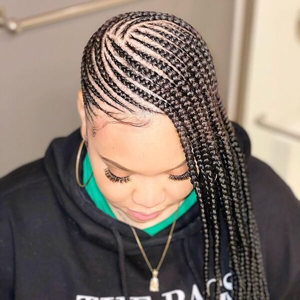 Classy Black Lemonade Braids - a woman wearing a black jacket