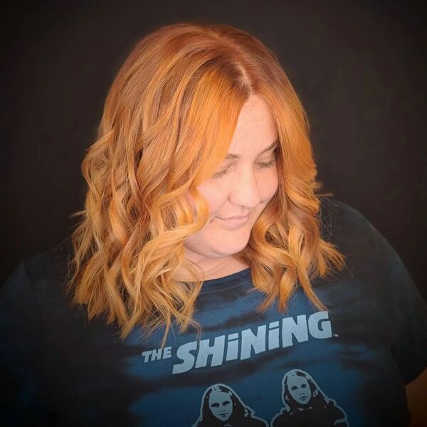 Copper Tint in Textured Waves - a woman wearing a shirt