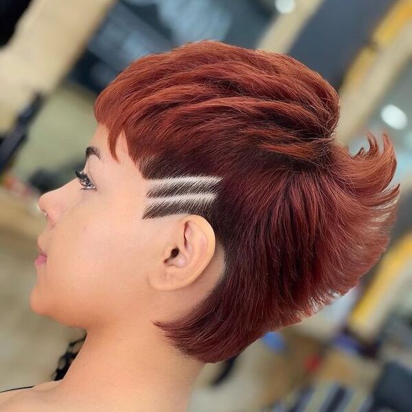 Creative Feathered Hairstyle and Undercut - a woman in a side view